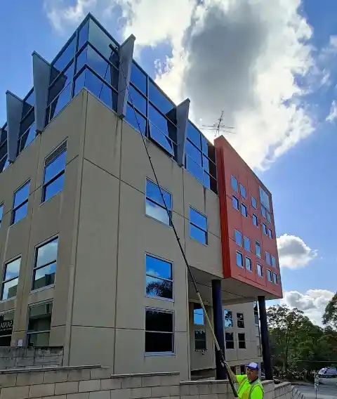 Cleaning windows of a tall commercial building